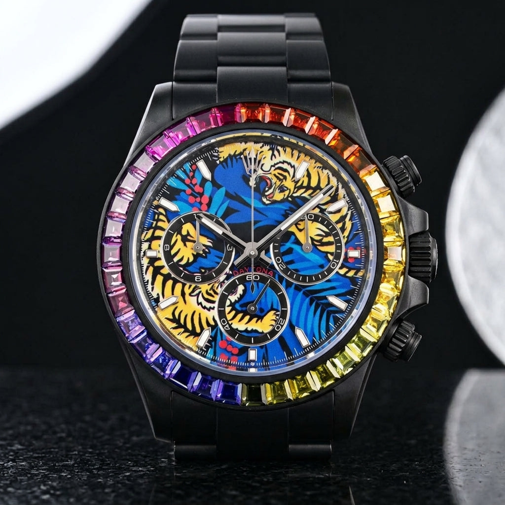 Black DLC chronograph with a tiger dial and rainbow stone bezel on a black steel bracelet, worn on the wrist below a navy suit cuff