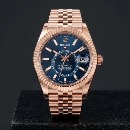 Studio photograph of the Sky-Dweller Rose Gold on black granite