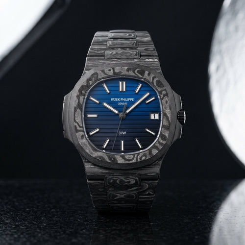 Carbon Sports Watch — Blue Gradient Dial — studio photograph on black granite
