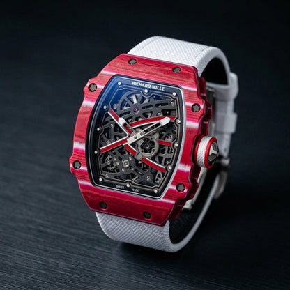 Three-quarter view showing the case profile and bracelet of the Raspberry Tonneau