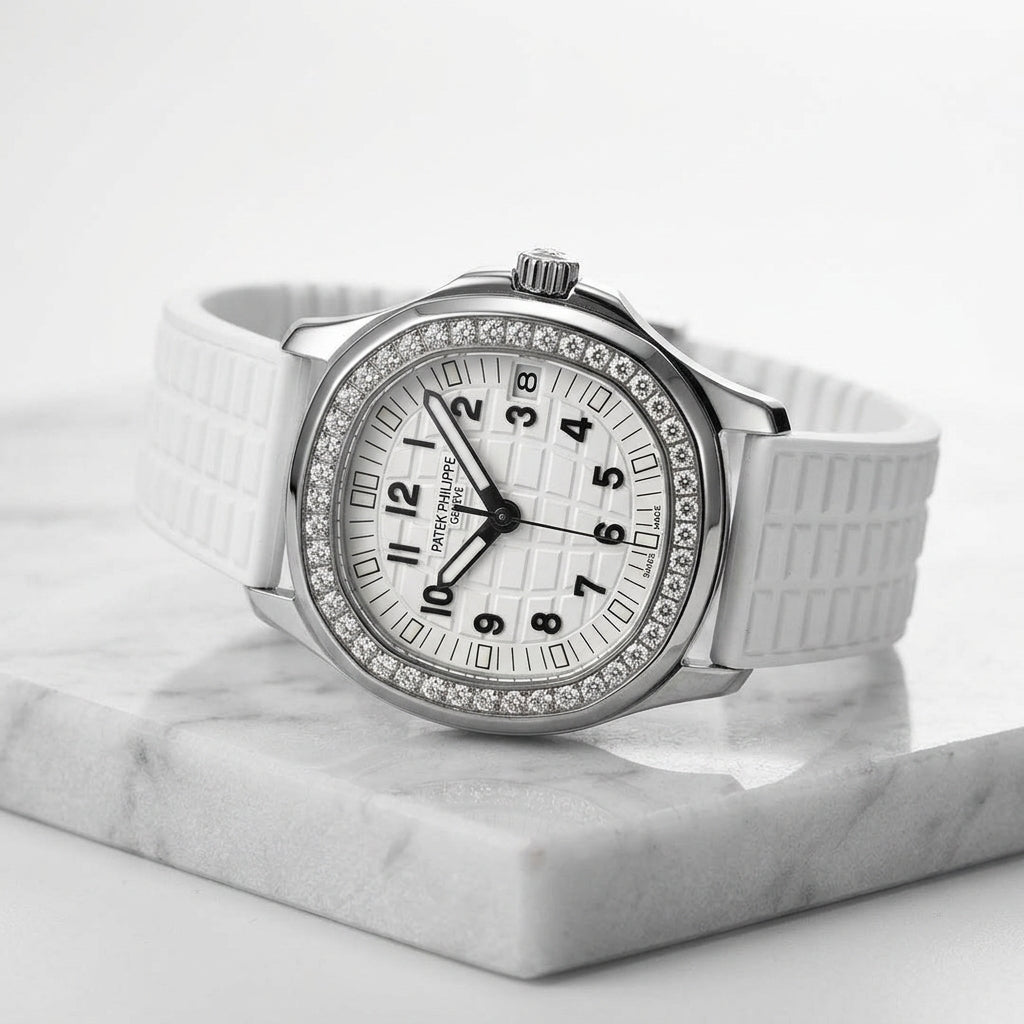 Three-quarter view showing the case profile and bracelet of the Aquatic Pavé