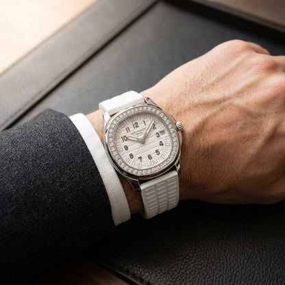 The Aquatic Pavé worn on the wrist beneath a tailored shirt cuff