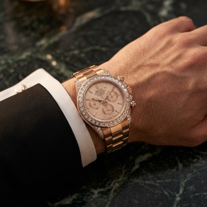 The Daytona worn on the wrist beneath a tailored shirt cuff
