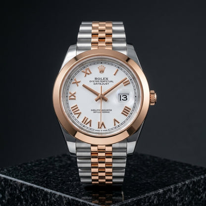 Studio photograph of the Datejust 41 on black granite