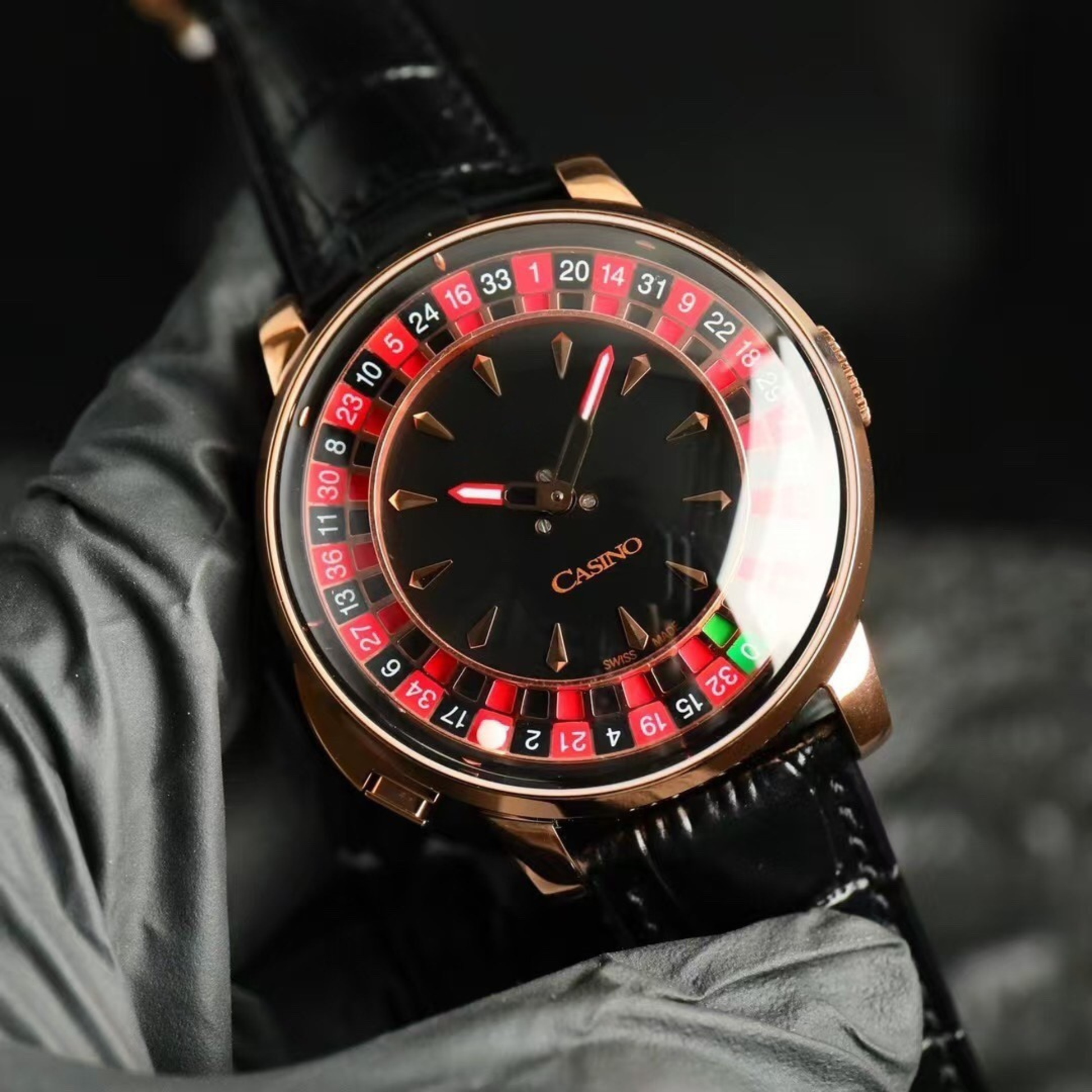 The Roulette — black leather strap, gold-tone case, precision roulette dial, luxury mechanical watch