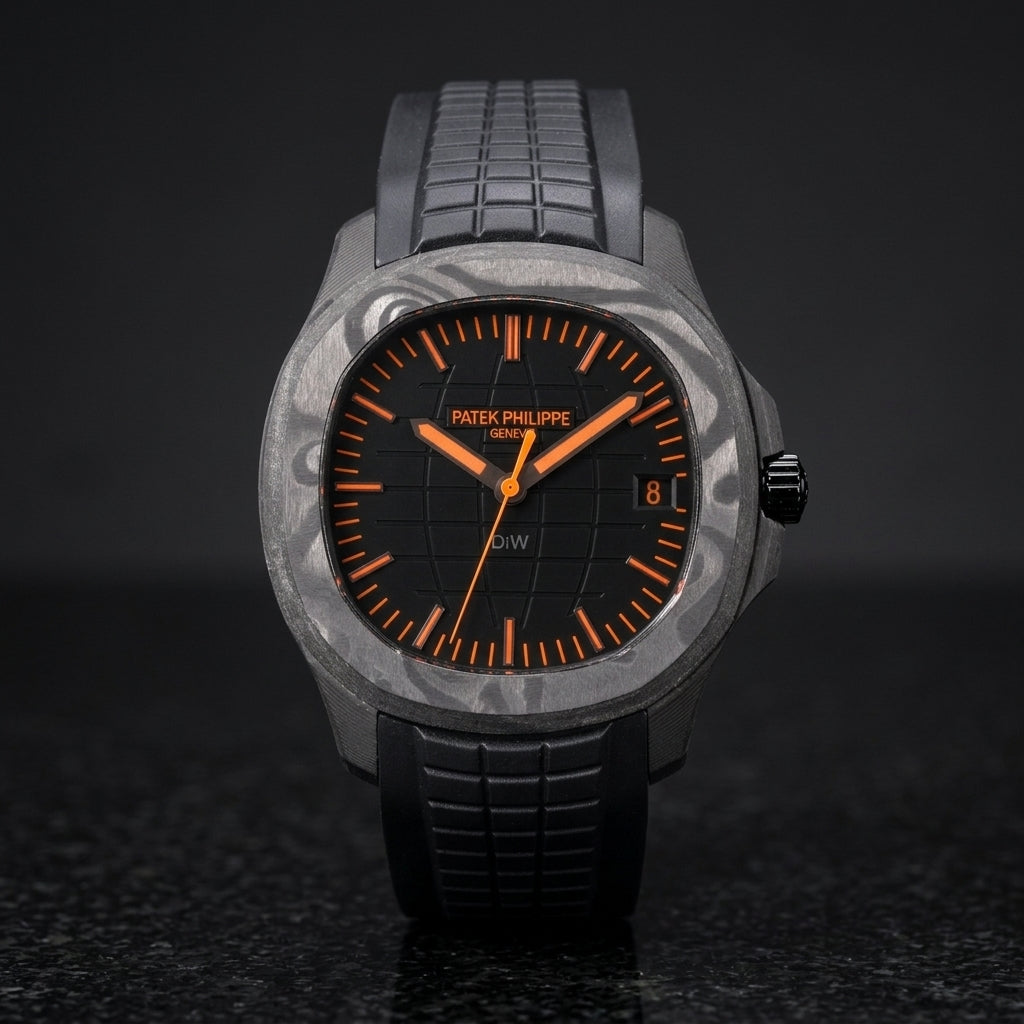 Black forged-carbon grid-dial watch with orange batons and a black rubber strap, upright on polished black granite