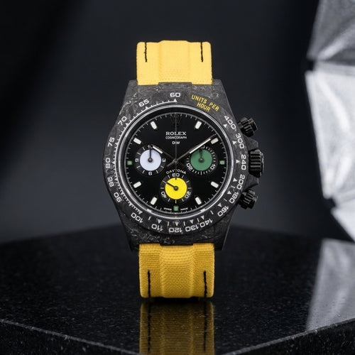 Studio photograph of the Yellow Racing on black granite