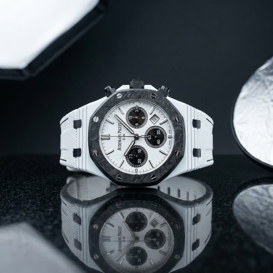 Studio photograph of the White Ceramic Sports on black granite