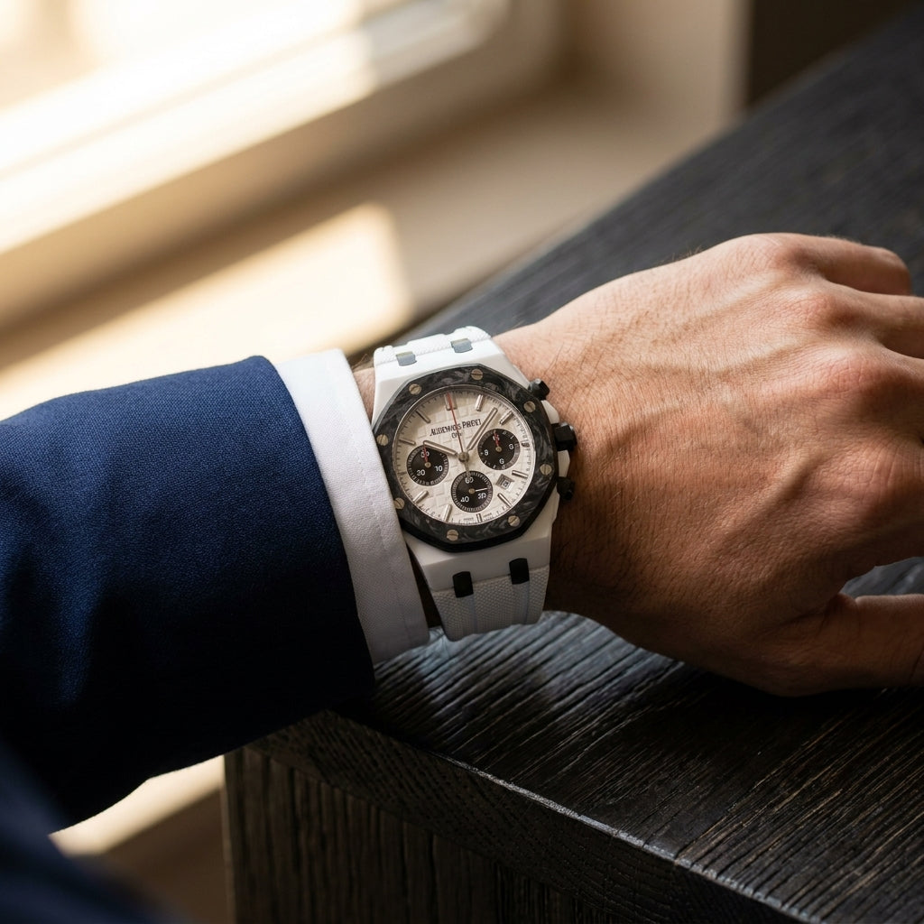 The White Ceramic Sports worn on the wrist beneath a tailored shirt cuff