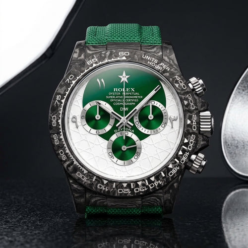 Forged-carbon chronograph with a green and white dial, star and crescent at twelve, on dark stone