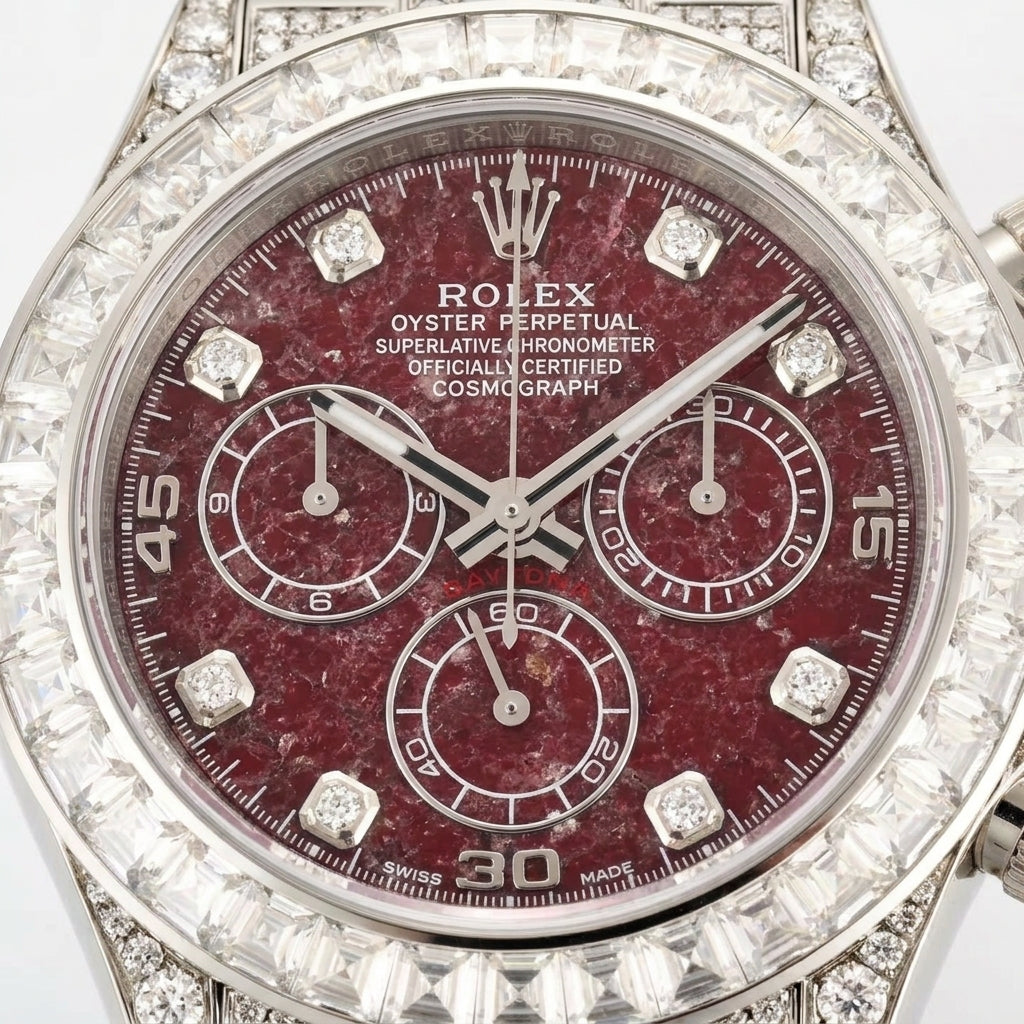 Macro of the red stone dial, three counters and the baguette-set bezel