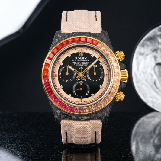 Forged carbon chronograph with black and rose gold dial and graduated stone bezel on black granite