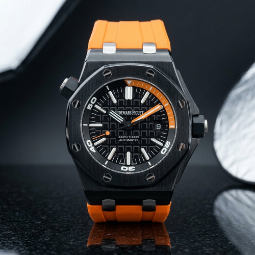 Black ceramic Offshore Diver with an orange inner scale and orange rubber strap on black granite