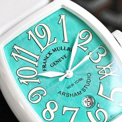 Macro of the turquoise guilloché dial with large cream-white numerals, the angular 4 and the round date window above the 6