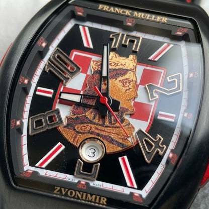 Macro of the glossy black dial with the copper-gold portrait of King Zvonimir over a red-and-white checkerboard shield