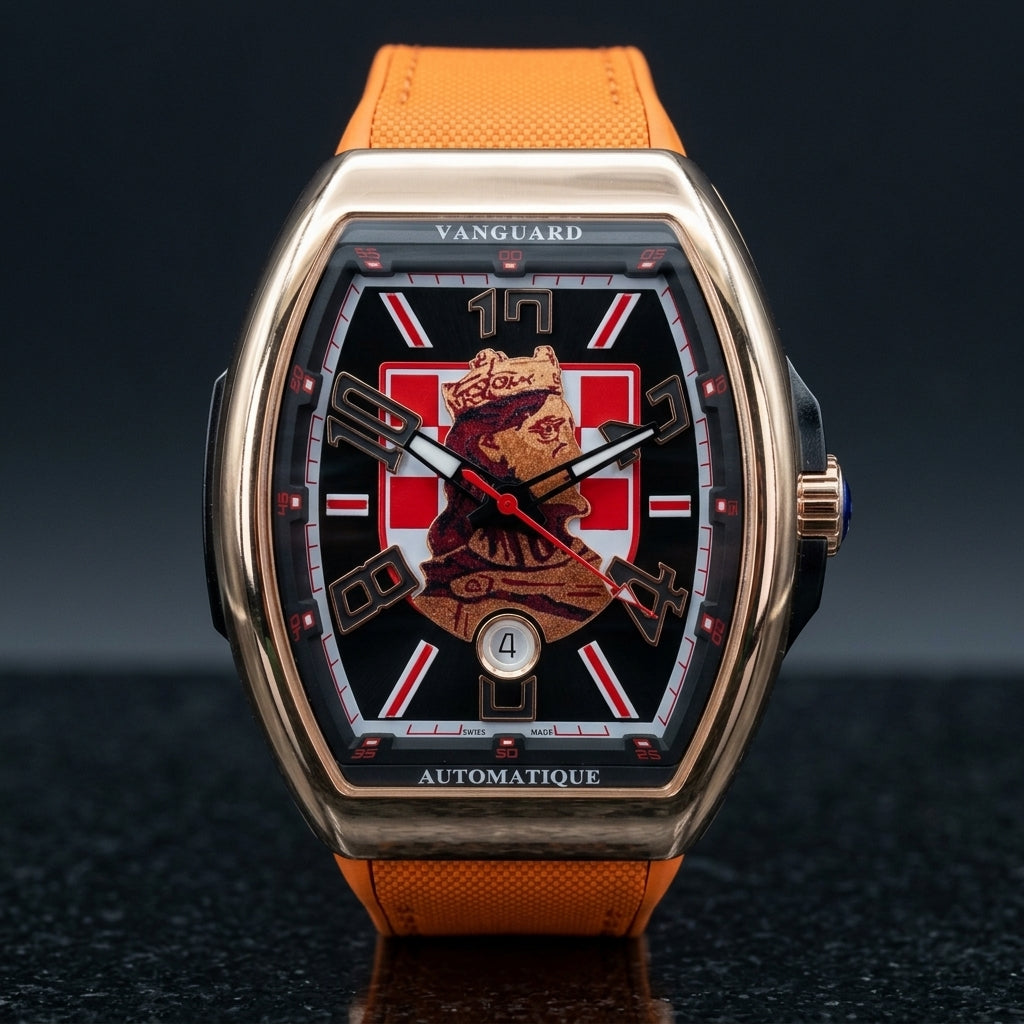 Rose gold curved tonneau watch with a black dial, a red-and-white checkerboard and a king's portrait, upright on dark slate
