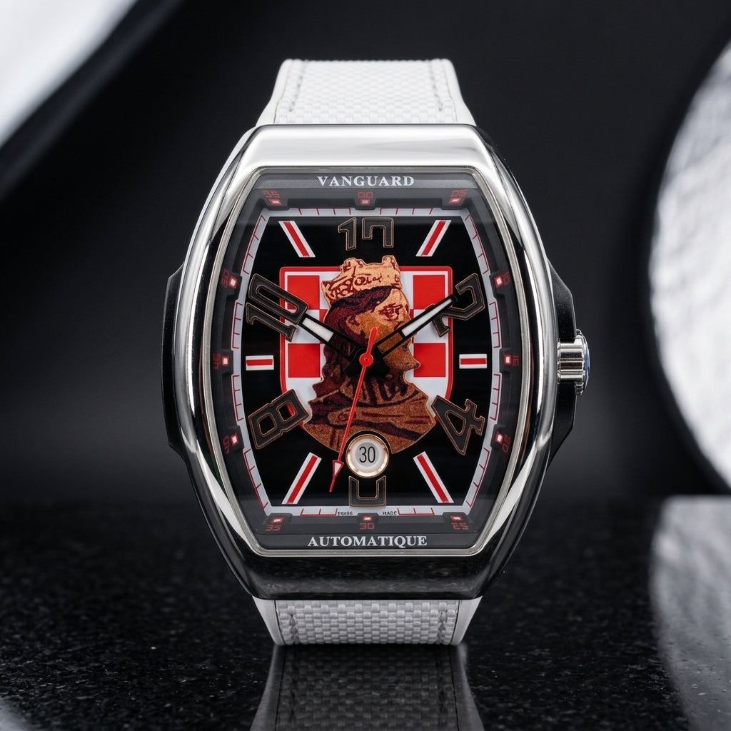 Steel curved tonneau watch with a black dial, a red-and-white checkerboard and a crowned king portrait, upright on polished black granite
