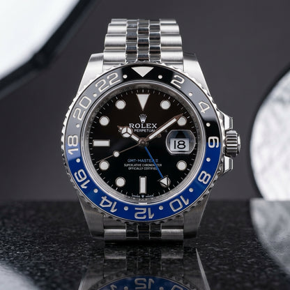 Studio photograph of the GMT Automatic on black granite