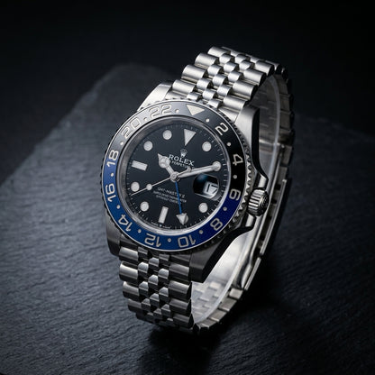 Three-quarter view showing the case profile and bracelet of the GMT Automatic