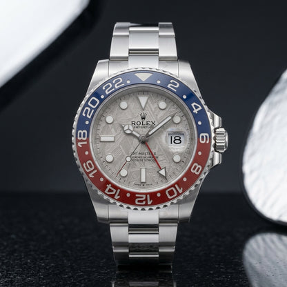 Meteorite dial GMT worn under a navy suit cuff