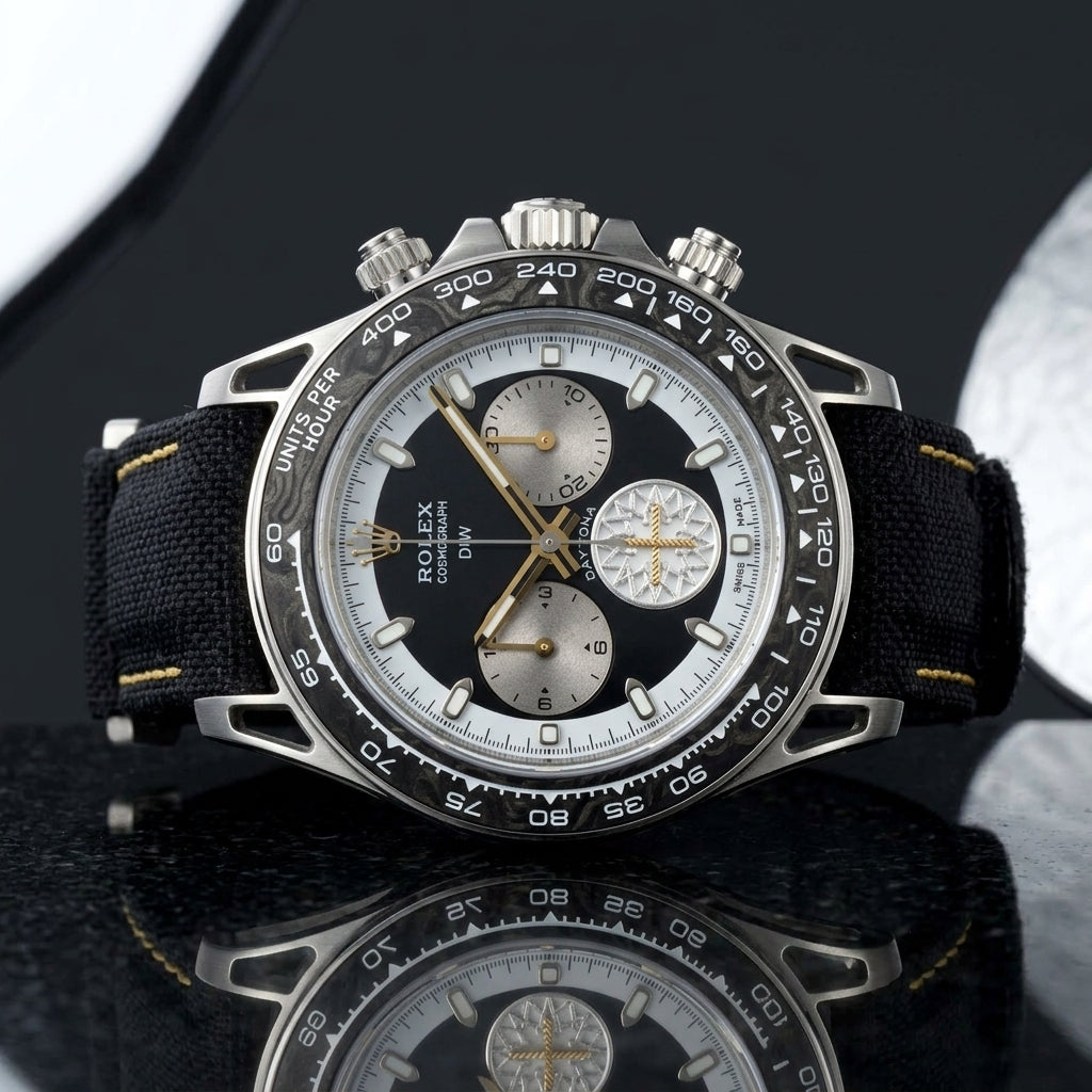 Forged carbon chronograph with hollow lugs and gold hands on black granite