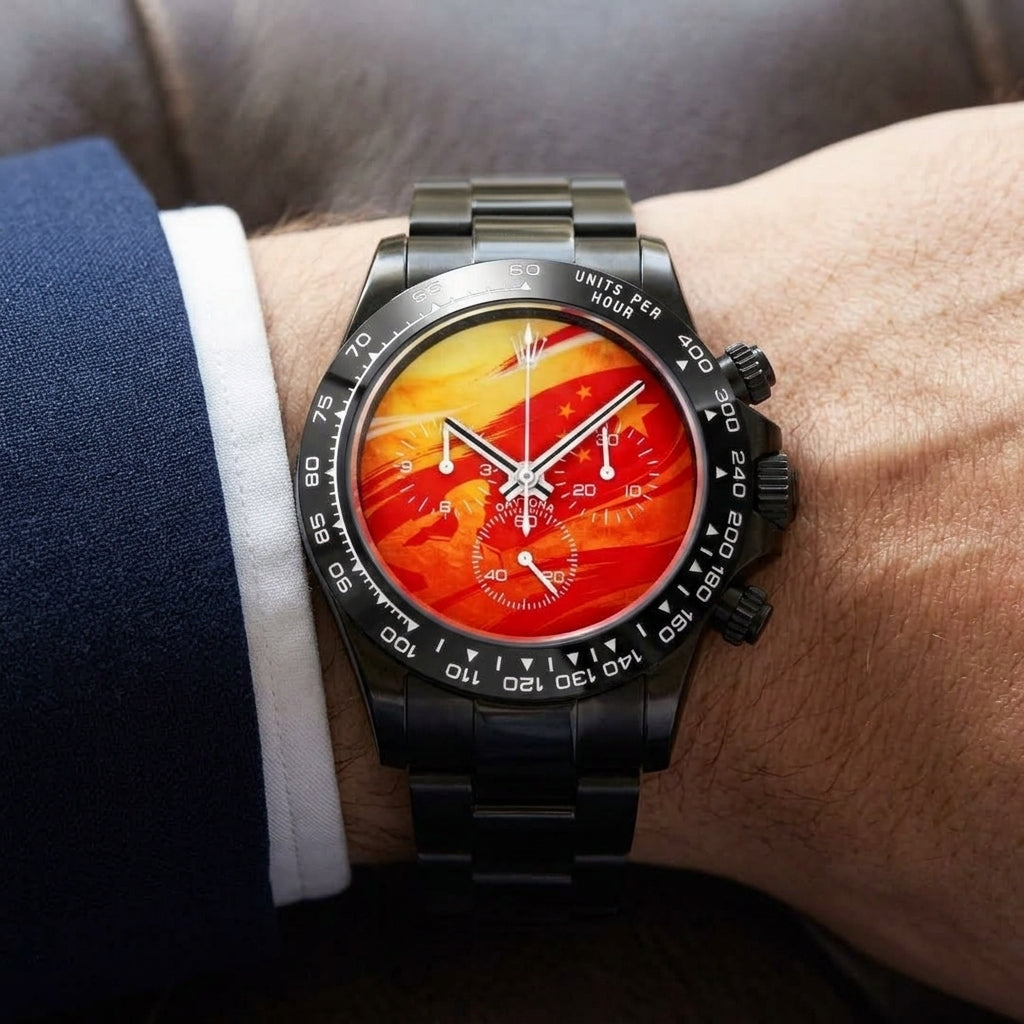 Black DLC lava-dial chronograph worn under a suit cuff