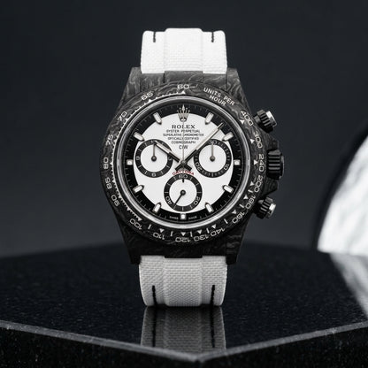 Studio photograph of the Forged Carbon Automatic on black granite
