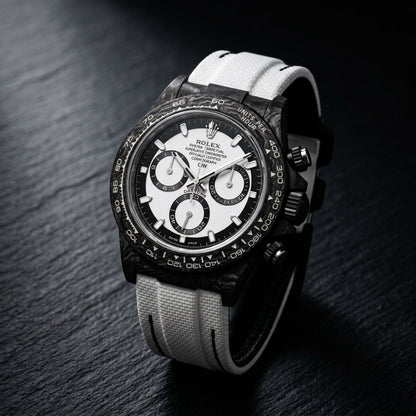 Three-quarter view showing the case profile and bracelet of the Forged Carbon Automatic