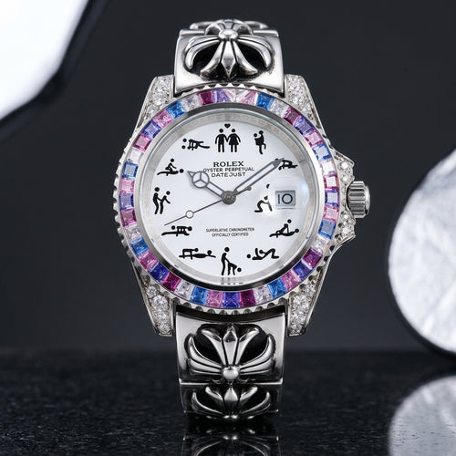 Studio photograph of the Naughty O'Clock on black granite