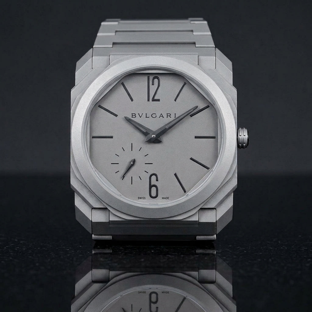 Sandblasted titanium octagonal watch and integrated bracelet on black granite