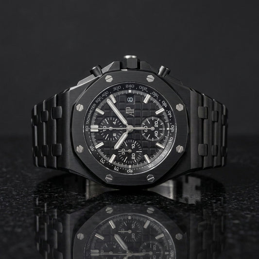 All-black ceramic octagonal chronograph watch on black granite