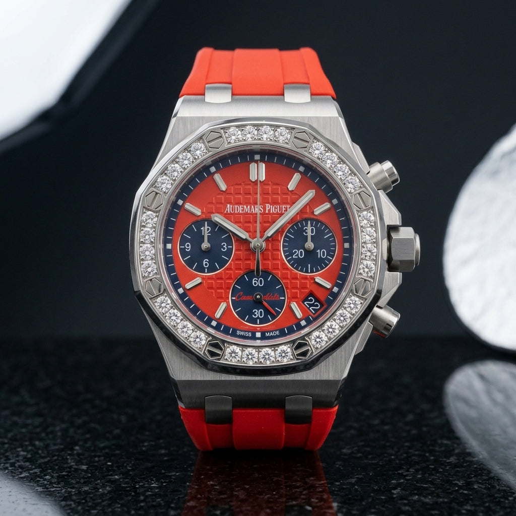Steel octagonal chronograph with diamond bezel and red dial on black granite