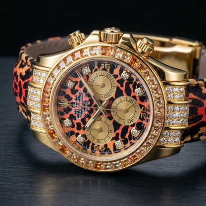 Leopard dial gold chronograph at a three-quarter angle on dark slate