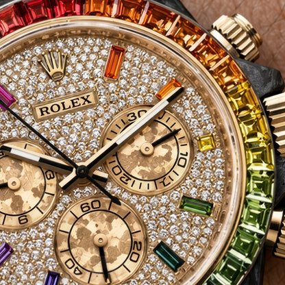 Macro of the gold pavé dial, its rainbow hour stones and three mottled gold counters inside the rainbow bezel