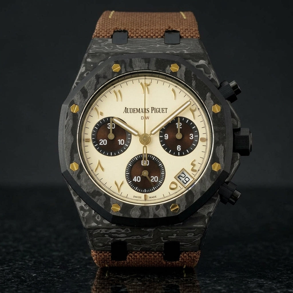 Black forged-carbon octagonal chronograph with a cream dial and gold Eastern Arabic numerals, upright on polished black granite