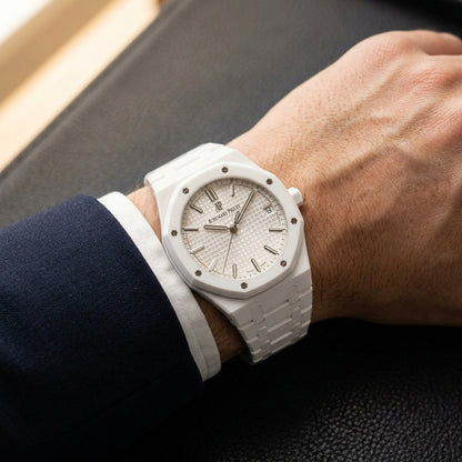 Octagonal Sports Watch — White Ceramic — worn on the wrist under a tailored cuff