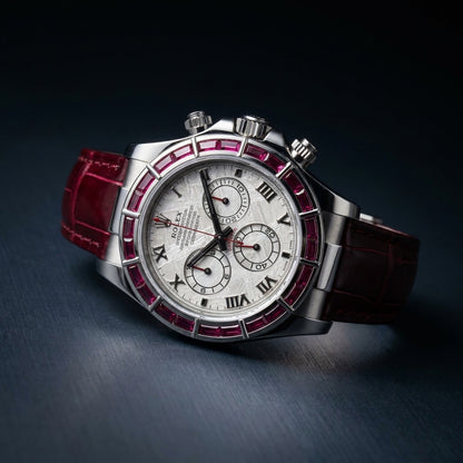 Three-quarter view showing the case profile and bracelet of the Ruby Baguette Bezel