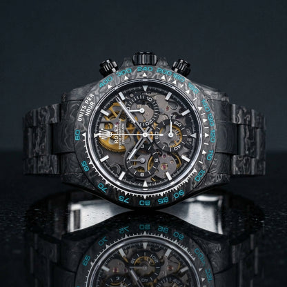Carbon skeleton chronograph worn under a suit cuff