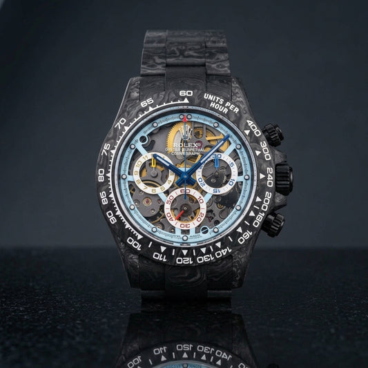 Forged carbon skeleton chronograph with an ice-blue skeleton dial on black granite