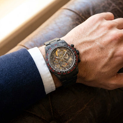 Carbon skeleton chronograph worn under a suit cuff