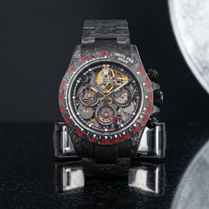 Carbon skeleton chronograph worn under a suit cuff