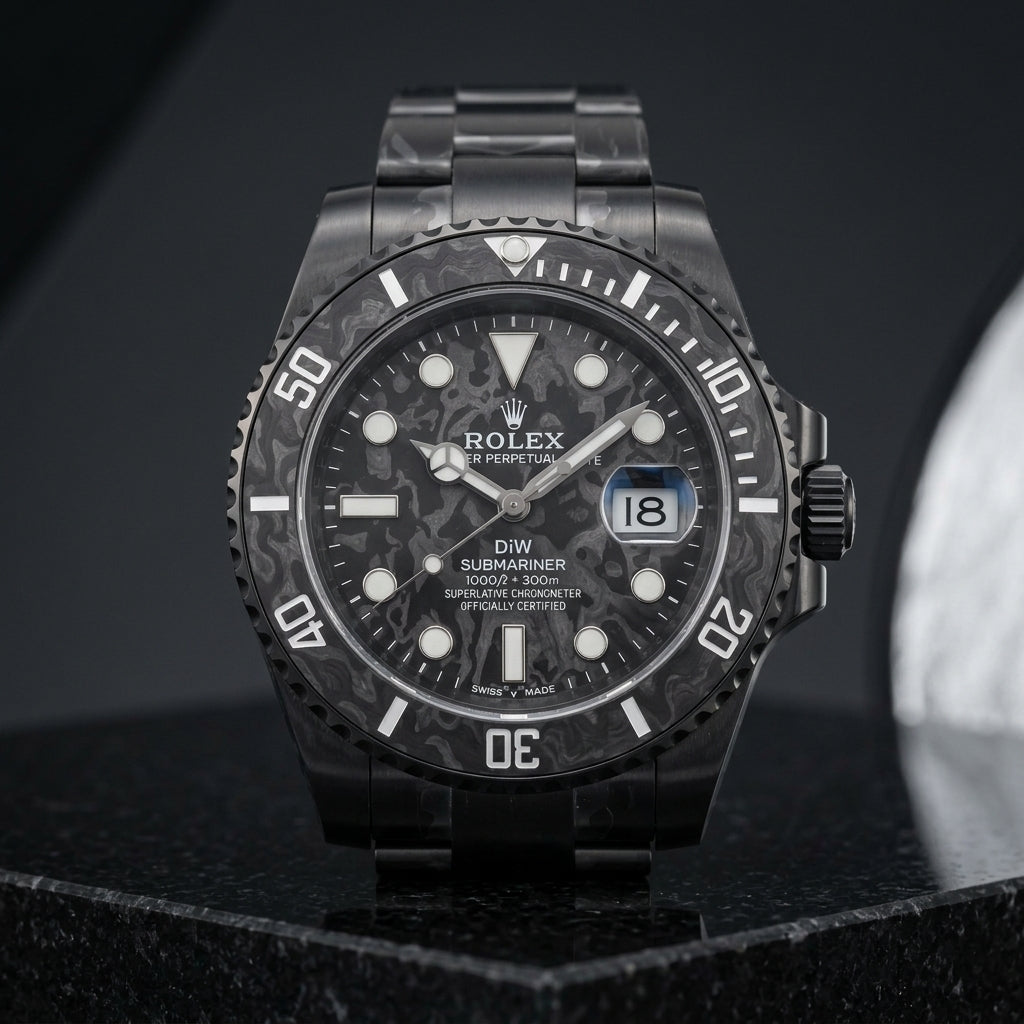 Black carbon dive watch worn under a navy suit cuff
