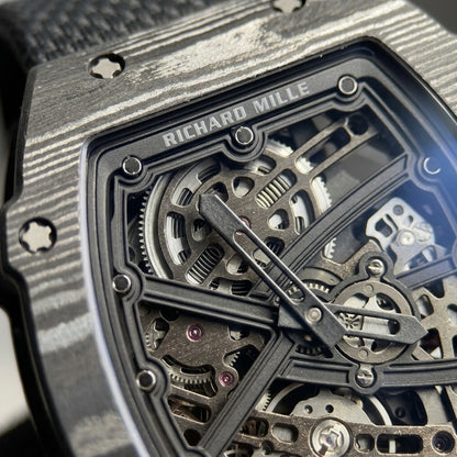 Macro of the open skeleton dial: the black frame and X, silver-grey screws, black hands and the frosted grey movement