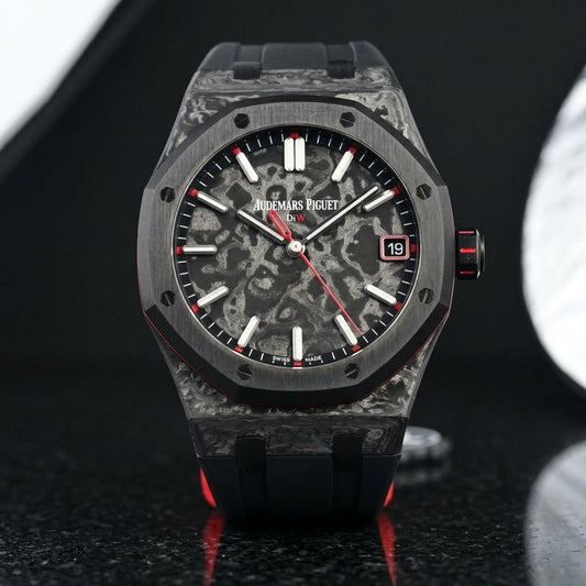 Forged carbon octagonal watch with a marbled dial and red accents on black granite