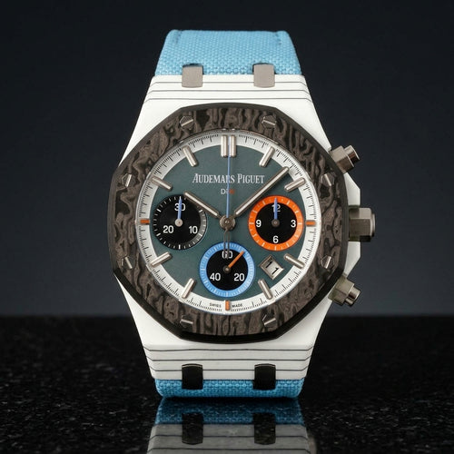 White quartz-fibre racing chronograph with black carbon bezel and teal dial