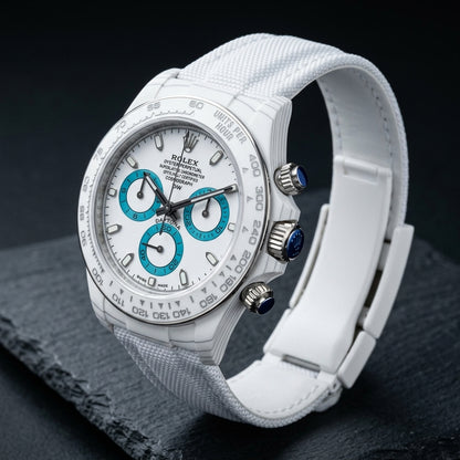 Racing Chronograph — White Ceramic, Turquoise Counters — three-quarter view showing case and bracelet profile