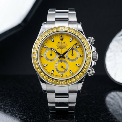 Yellow dial steel chronograph worn under a navy suit cuff